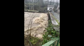 Debris Piles Up Against Castle Bridge