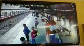 Heart-stopping moment man dashes across tracks missing speeding train by inches