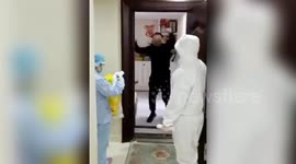Chinese man enthusiastically dances to celebrate the end of his self-quarantine