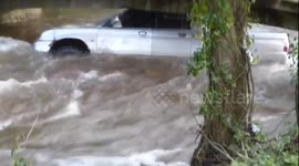Storm Dennis: Lucky escape for driver as truck gets stuck under bridge in raging river in Somerset: Part 2