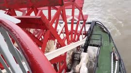 Paddle boat going down the Mississippi river