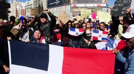 Hundreds of residents of the Dominican Republic in Madrid, Spain demonstrated in Plaza de Callao  protesting for the suspension of municipal elections in the Dominican Republic.