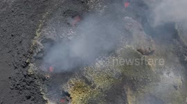 Detailed show on crater of Pacaya with lava inside