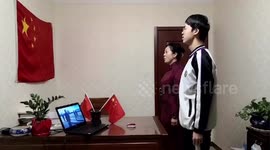 Chinese school live streams flag-raising ceremony online due to COVID-19 outbreak