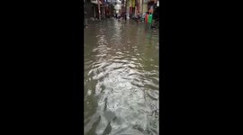 Widespread flooding across Indonesia's Jakarta forces shops to temporarily close