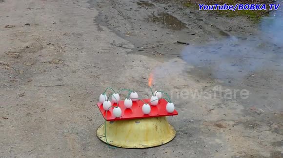 YouTuber sets up fiery chain reaction using match heads inside eggshells