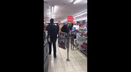 Two shoppers fight near the tills of supermarket in quarantined Italian town