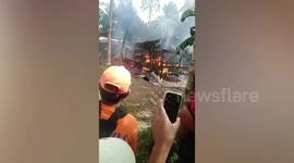 Filipino children burned alive after being locked in house by babysitter