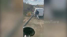 Brazen fly-tipper dumps rubbish by UK highway in broad daylight