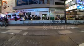 Riot police shoot tear gas at protesters on Hong Kong's Nathan Road