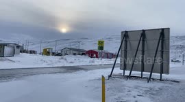 Snowmobile driving in Icelandic village
