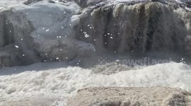 Big Sioux River Falls foam get carried away in strong and gusty winds (Part 2)
