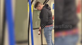 Brazen moment man caught urinating and exposing himself on London Underground