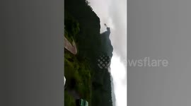 Coach Negotiates Sharp Mountain Road