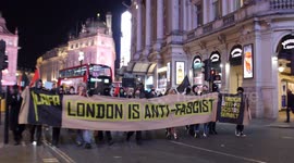 Anti-fascist rally in London directed at Italian deputy PM features dancing clowns amid police intervention