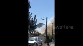 Newsflare Edit - Helicopter flying over Mann fire in Southern California