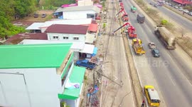 Storm causes string of power poles to collapse in northern Thailand