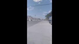 Taxi with passengers inside blown over by dust devil mini-tornado in the Philippines
