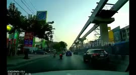 Careless Motorcycle Rider Hits Back Of Car