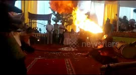 the wedding in Bukittinggi was enlivened by the play of fire and immunity