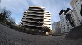 Cool BMX Riders jumping on urban Skatepark