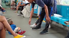 happy to take people on the MRT Train holiday. children reprimanded security guards lying on the floor