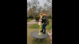UK man cannot stop laughing as his partner struggles to get off playground roundabout