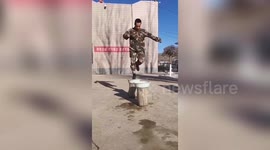 Chinese policeman shows off incredible balance by jumping on bowls of water