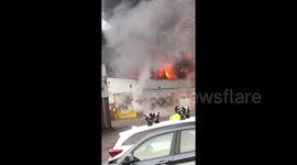 Explosive fire rages through industrial estate in Reading, southern England