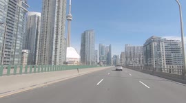Shots of Toronto skyline and lighter than usual rush hour traffic this afternoon possibly due to more people working from home and other travelling less due to coronavirus fears