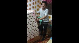 Father who had been working overseas surprises children by hiding inside giant present