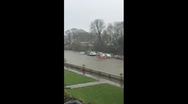 Kayakers battle wind and large hailstones on the Thames
