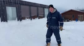 Trying the strength of the snow around the house