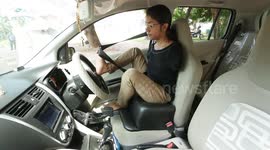 Woman born without hands learns to drive with her feet against all odds