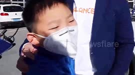 Heartwarming moment boy hugs mom upon returning from coronavirus hospital after nearly a month