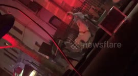 New York paramedics seen transporting person in protective gear