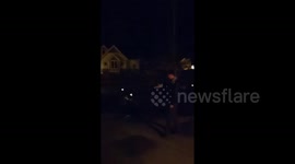 Homemade arm mounted flamethrower in action