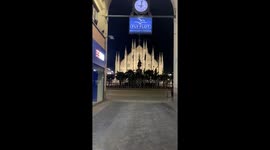 Duomo square in Milan, Italy at night during lockdown