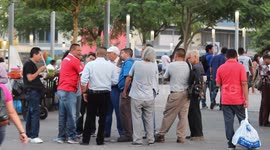 Salvadorians gather in city squares despite national quarantine issued by president