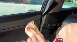 This is how the woman with Russia's longest nails completes everyday tasks