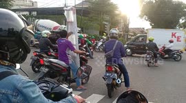 on the highway motorists bring hands without seeing the road