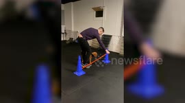 Dog hilariously tries and fails to jump over obstacle at puppy training class