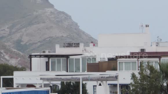 Quarantined Spaniard seen jogging on ROOF to break lockdown tedium