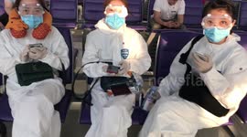 Tourists seen wearing hazmat suits and googles at Thai airport