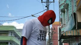 Local Spiderman Of Indonesia Distribute Antiseptic Soap For People's