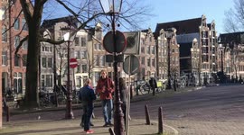 Amsterdam police struggling to get people off the streets in spring weather