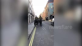 Mounted patrols seen on deserted London streets on first day of lockdown