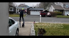 New Jersey resident manages to ride electric unicycle while wearing stilts