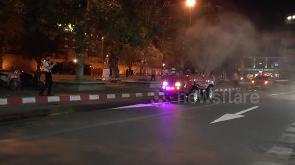 Thailand government use vehicles to roam streets and spray disinfectant