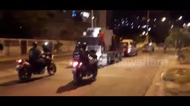 Venezuelan police pass through the streets ordering to be at home to avoid contagion with COVID-19